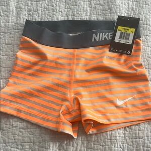 Nike Orange and Gray Athletic Shorts with Stripes